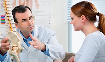 A Doctor Talking to a person about medical issues 